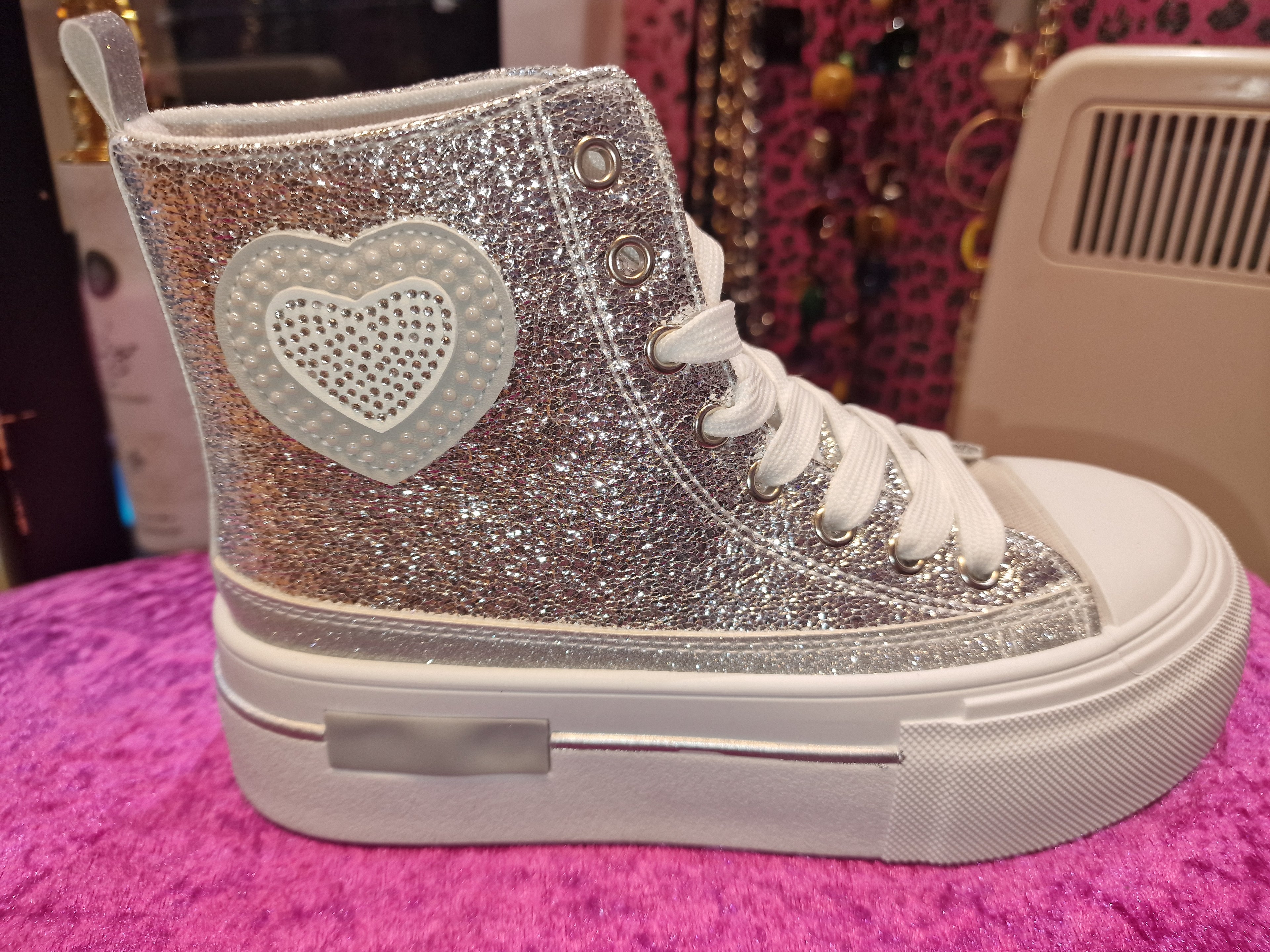 Silver sparkle baseball boots.
