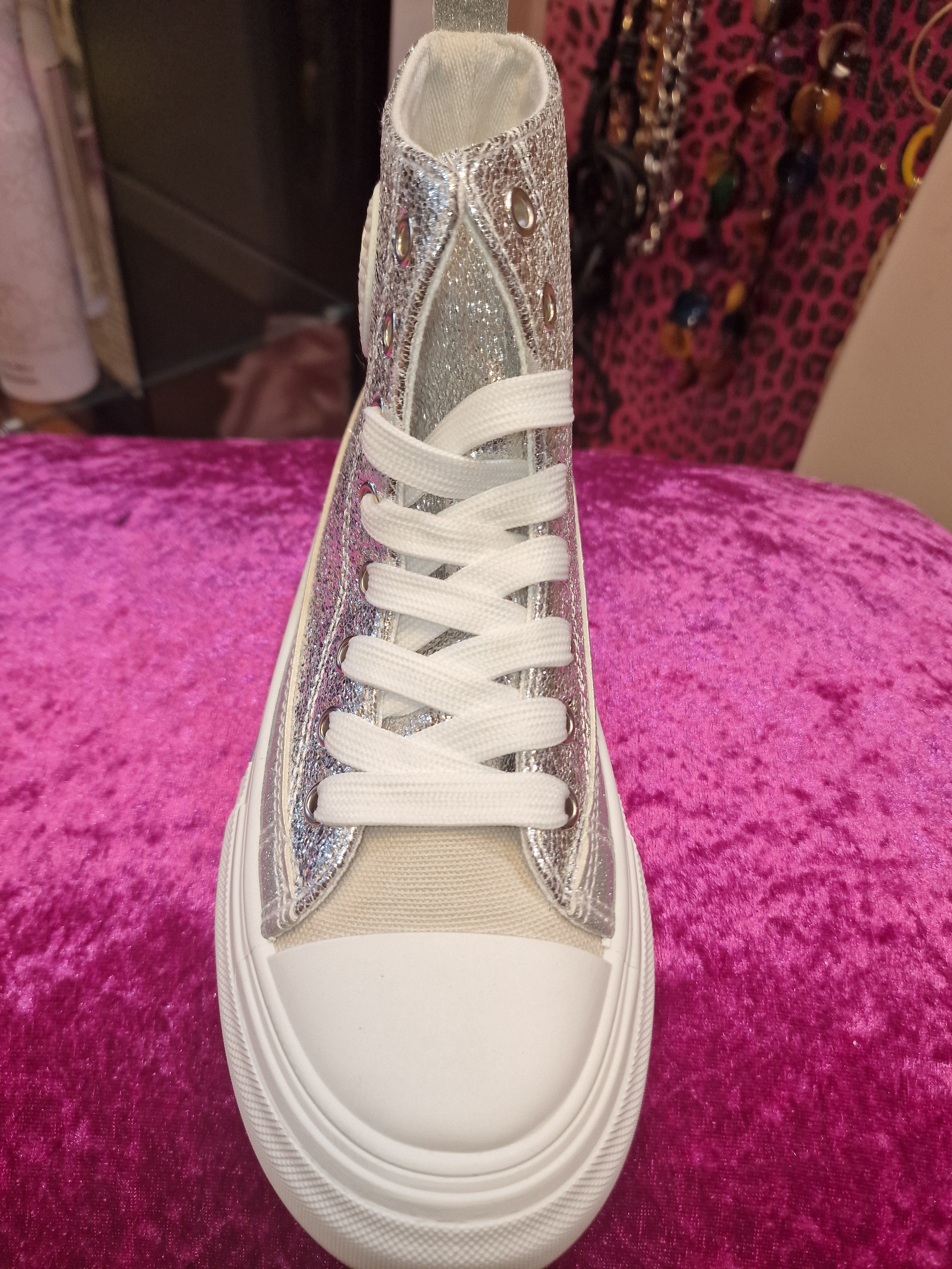 Silver sparkle baseball boots.